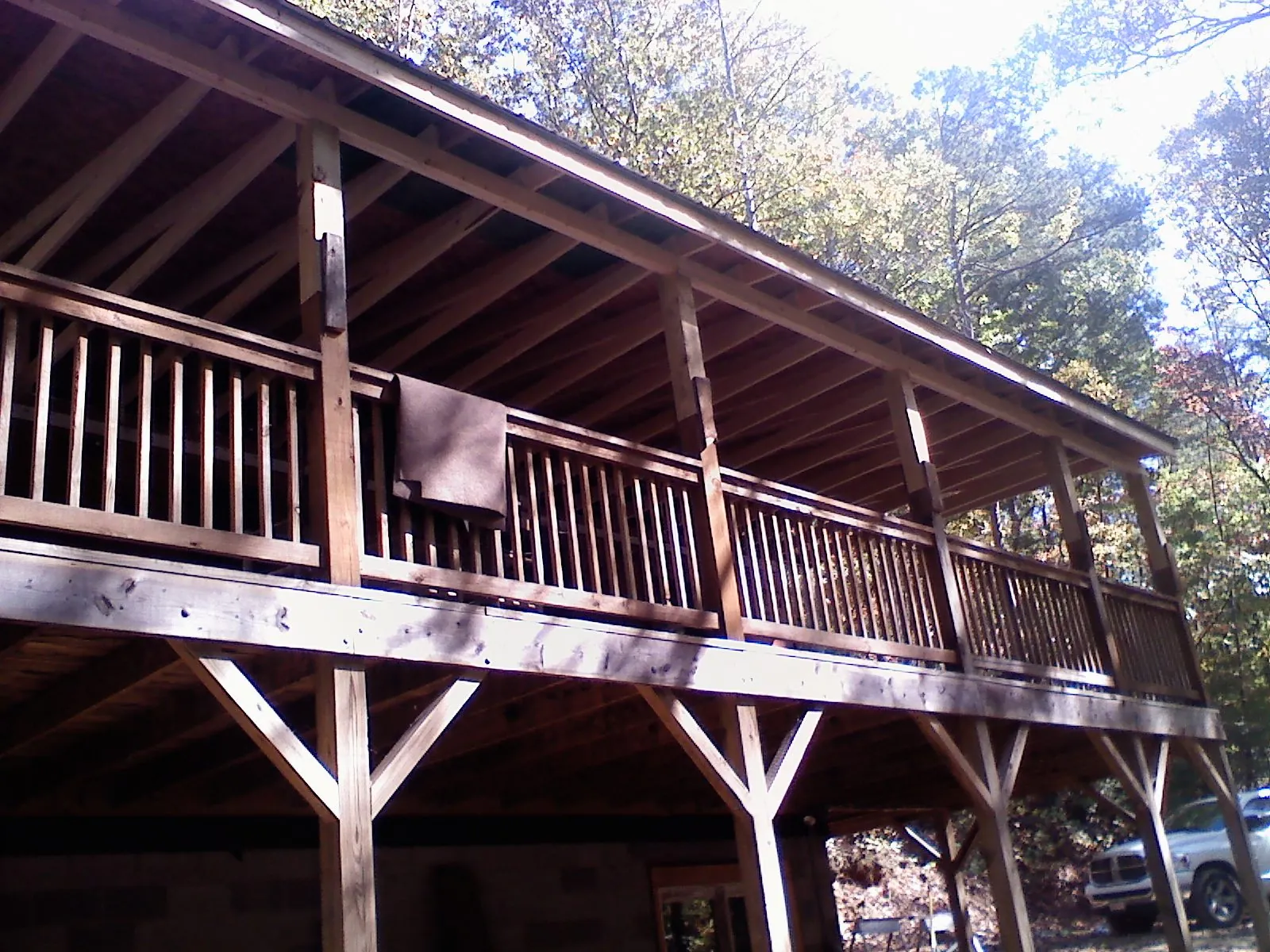 Timber framing under a new elevated porch and deck — Roof Leak Repair in Malta by Roofing Brothers